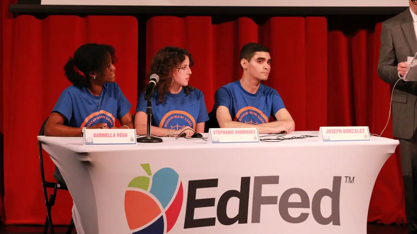 A school team works the buzzers.