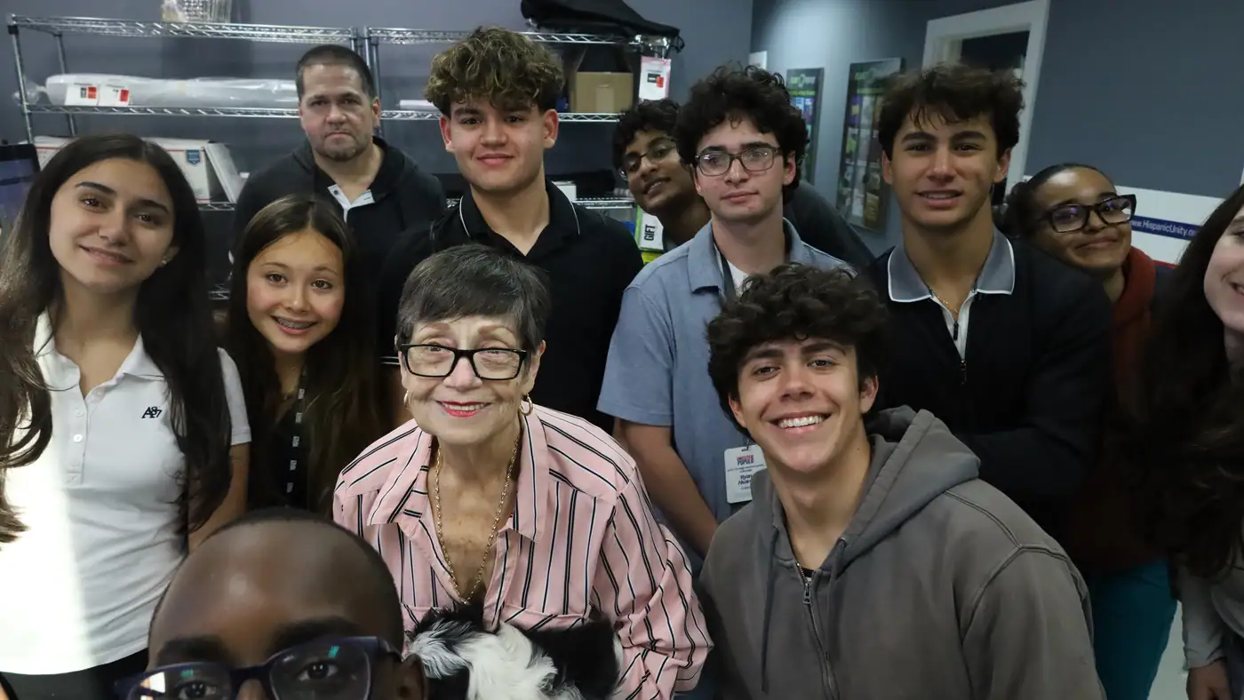 Fellows tour a neighborhood print shop and its economics.