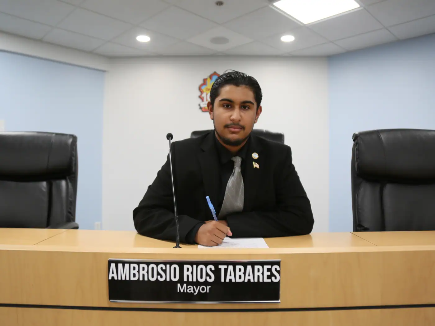 The mayor's seat, nameplate and all, occupied for the day.